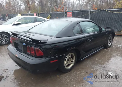 1997 Ford Mustang из США, поврежденный, VIN 1FALP4045VF110894